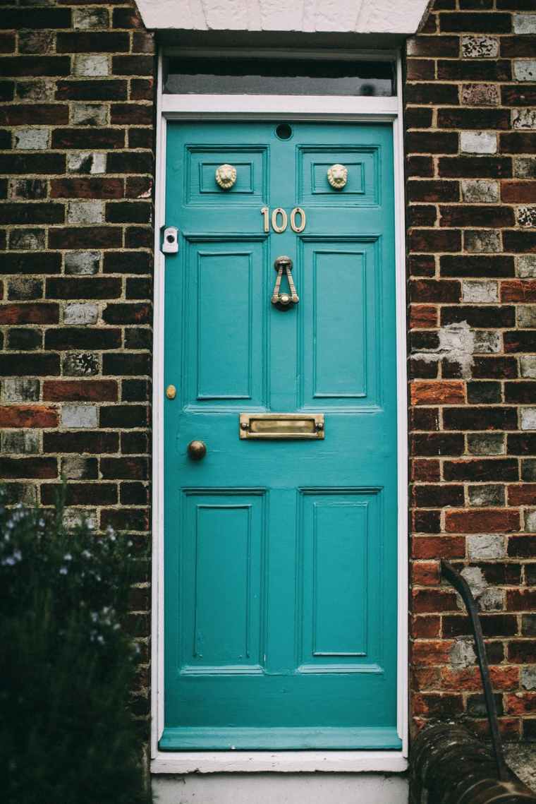 teal wooden panel door